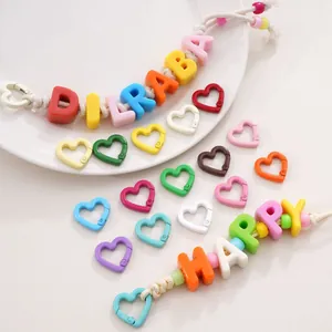 Handmade DIY keychain accessories set with colorful heart clasps and alphabet beads