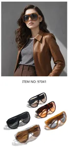 Futuristic Y2K wrap-around oversized sunglasses shown on model and in multiple color variants