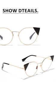 Detail view of vintage gold metal cat-eye glasses with unique black triangular accents