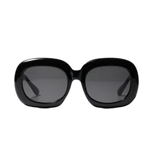 Lunettes de soleil rétro surdimensionnées noires rectangulaires pour un look tendance
