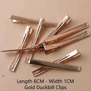 Professional gold metal duckbill hair clips for DIY crafts, measuring 6cm long and 1cm wide