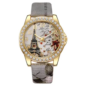 Vista detallada de reloj de cuarzo para mujer con esfera de la Torre Eiffel y