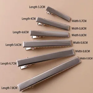 Detailed showcase of silver metal alligator clips in various sizes for DIY hair accessories