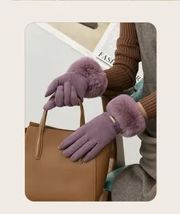 Detailed view of soft purple winter gloves for women featuring plush faux fur cuffs
