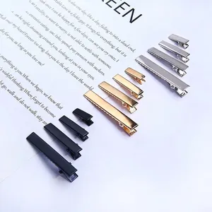 Detailed view of metal duckbill hair clips in silver, gold, and black for DIY accessories.