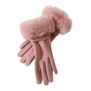 Elegant pink women's winter gloves with cozy faux fur cuffs and touch screen fingertips