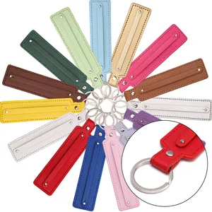 Assorted colorful faux leather keychains set with silver metal rings for DIY accessories