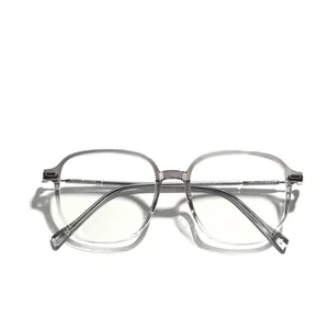 Stylish large frame TR90 eyeglasses with transparent grey finish and glitter temples