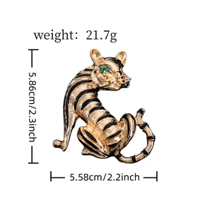 Detail view of vintage tiger brooch showing dimensions 5.86cm and weight 21.7g.