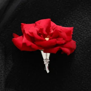 Creative DIY silver funnel brooch holder featuring a realistic red rose accent
