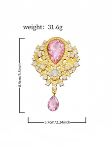 Detail of vintage pink crystal teardrop brooch with size and weight measurements
