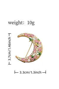 Detailed size and weight view of sparkling crescent moon brooch with pink and clear crystals