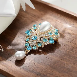 Broche vintage élégante de style français avec strass bleus et perles en goutte