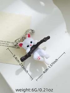 Gedetailleerd overzicht van 3D kat op tak hars broche met maat- en gewichtsspecificaties