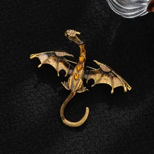 Vintage goldener Drachen Brosche mit bernsteinfarbenen Strasssteinen und Emaille