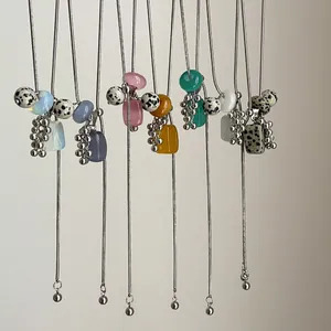Stylish adjustable long necklace with natural Dalmatian stones and colorful beads