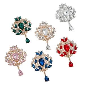 Elegant vintage crystal teardrop brooches featuring colorful rhinestones in alloy setting.