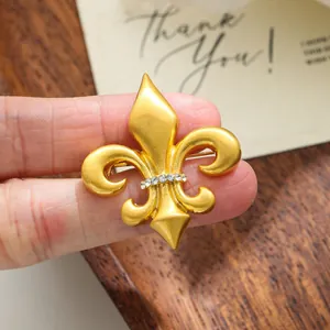 Vintage gold fleur-de-lis brooch with crystal accents for men's suit lapel pins
