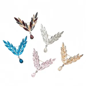 Set of five elegant crystal angel wing brooches in various vibrant colors for suits