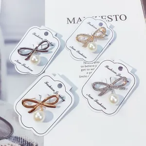 Set di eleganti spille a fiocco con perle in oro e argento per maglioni da donna