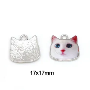 Detailed close-up showing front and back of 17x17mm cat head alloy charms for DIY
