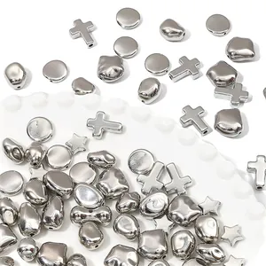 Assorted silver metallic CCB beads in cross and star shapes for handmade DIY jewelry making