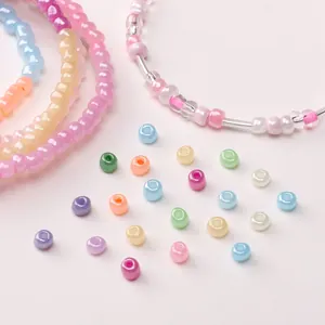 Close-up of 4mm colorful cream glass seed beads for DIY handmade jewelry crafts