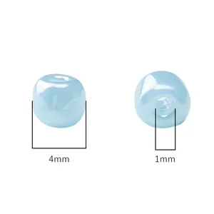 Close-up of 4mm light blue glass seed beads with 1mm hole diameter measurement