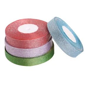 Detailed view of glitter metallic ribbon rolls in red, purple, green and blue colors