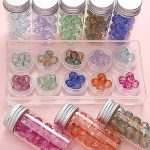 Vue détaillée de perles de verre à facettes de 10 mm de couleurs variées pour bijoux DIY.