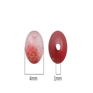 Close-up of 4mm glass beads with 1mm hole diameter for DIY jewelry making projects.