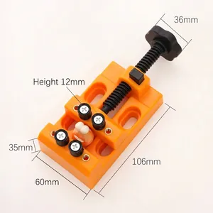 Dimensiones detalladas de un mini tornillo de banco naranja para joyería y cuentas
