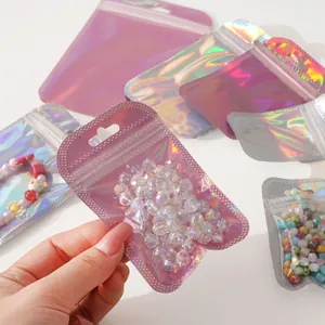 Holographic pink jewelry bags with ziplock closure for bead storage detail