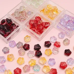 Detalle de cuentas de vidrio de 12mm en forma de rosa de varios colores para manualidades de bricolaje