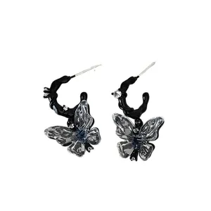 Dark cool liquid-style transparent resin butterfly hoop earrings for stylish women