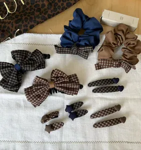 Vintage brown checkered hair accessories set including scrunchies and star BB clips