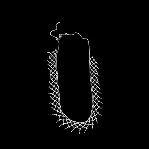 Close-up detail of elegant silver mesh lace necklace featuring an intricate woven design