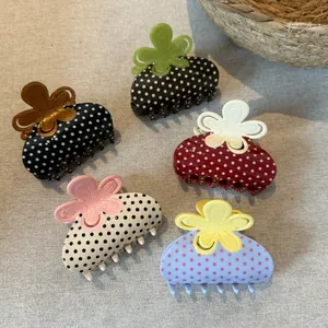 Cinque mollette per capelli stile coreano a pois con graziose decorazioni floreali.