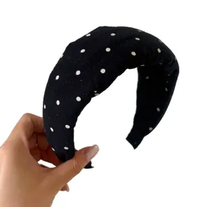 Cerchietto largo retrò nero a pois bianchi per uno stile elegante a cranio alto