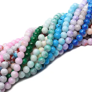 Close-up macro view of colorful 8mm marbled glass beads for DIY jewelry making kits