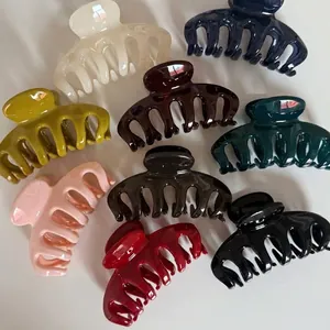 Detailed view of nine elegant colors for large dragon bone style hair claw clips