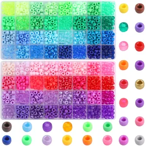 Macro view of 64 colors 9x6mm pony beads kit in two organizers for DIY jewelry making