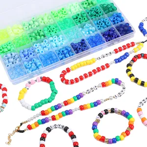 32-grid DIY jewelry making kit with colorful 9x6mm beads and alphabet letter charms
