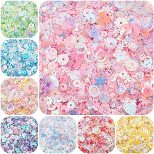 Detail view showing a variety of colorful mixed shaped sequins for DIY jewelry and crafts.