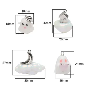 Detail view of Halloween resin pendants showing precise dimensions for DIY jewelry making.