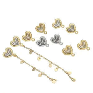 Detailed view of DIY heart earring findings with pave stones and dangle chains
