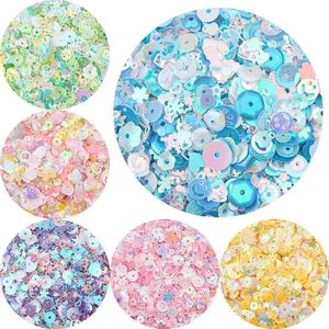 Detailed view of colorful mixed shaped sequins in various pastel color themes