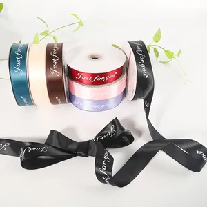 Assorted colorful satin gift wrapping ribbons with Just for you gold foil print