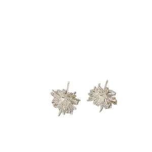 Elegant silver firework stud earrings with sparkling cubic zirconia stones for women.