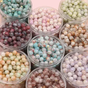 Assortimento di perline di vetro vintage colorate con schizzi d'oro per gioielli fai da te
